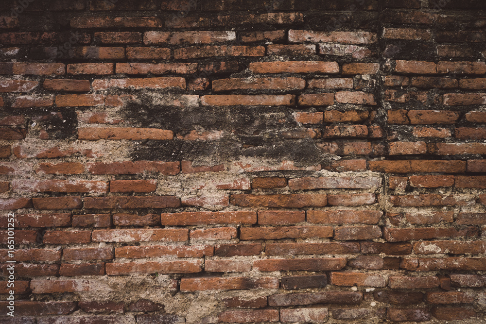 Red old worn brick wall texture background of temple wall. Vintage effect Red old worn brick wall texture background of temple wall. Vintage effect