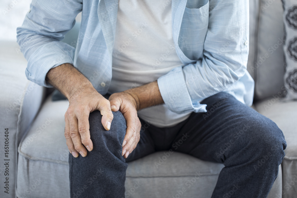 Old man suffering from knee pain Old man suffering from knee pain