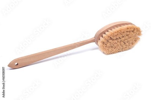 Natural bristle body brush with detachable long handle isolated on white background photo