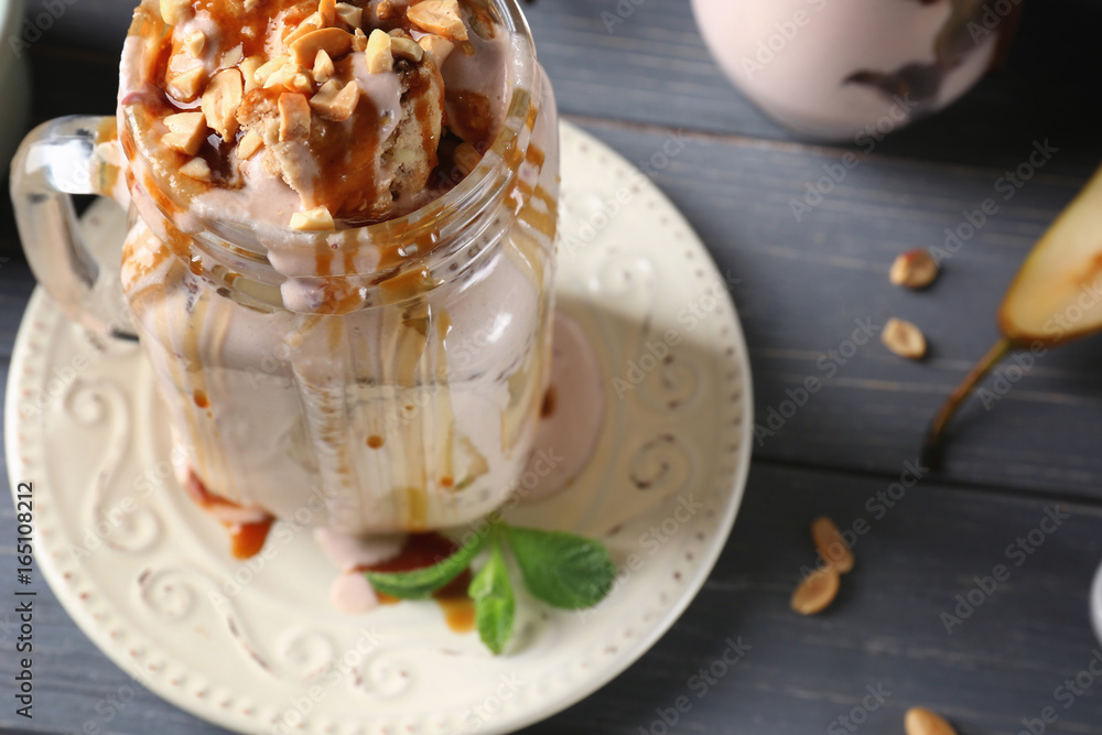 Delicious yogurt parfait in jar on table Delicious yogurt parfait in jar on table
