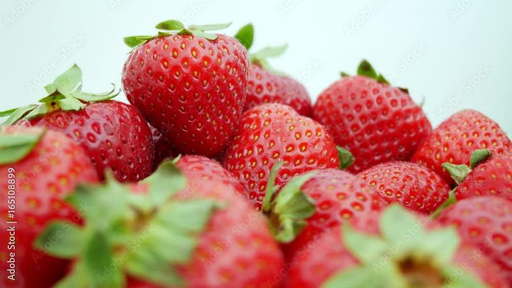 Red Strawberries Isolated on the White Background With Green Leaves Red Strawberries Isolated on the White Background With Green Leaves