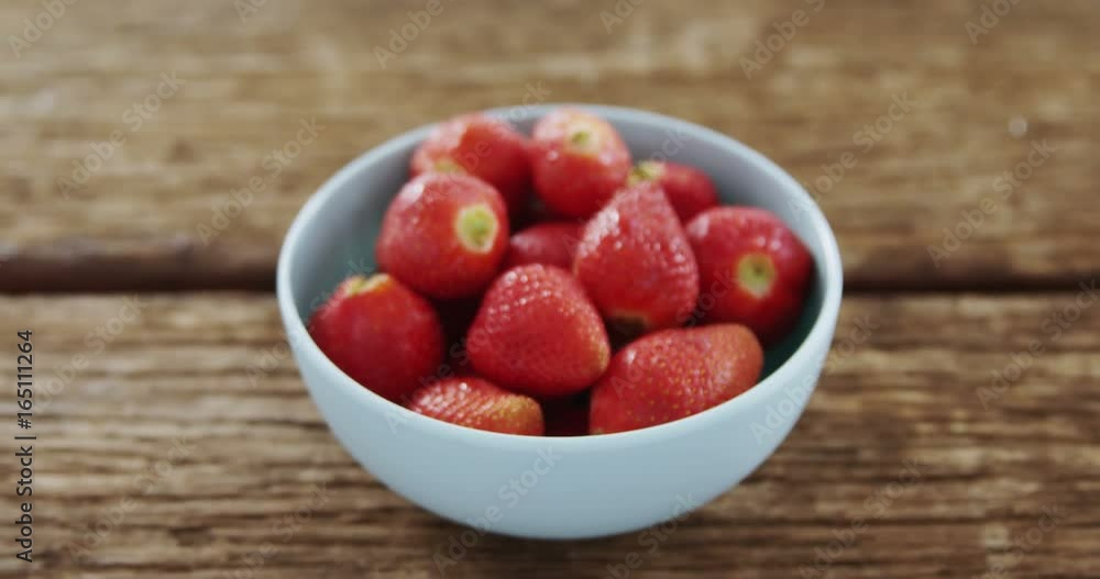 Overhead of fresh strawberries in bowl Overhead of fresh strawberries in bowl
