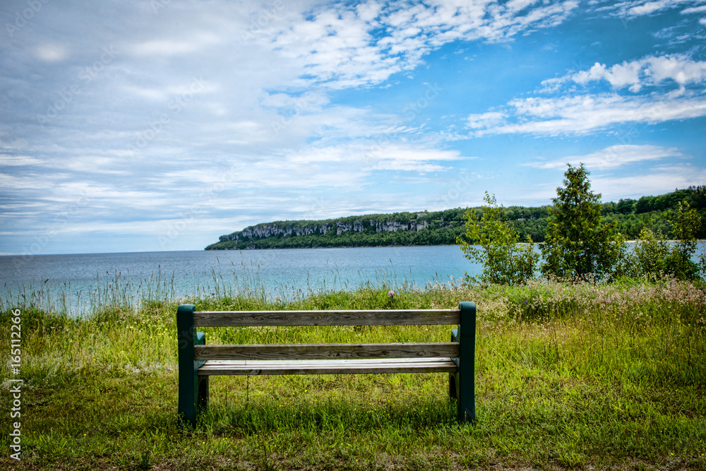 Lonely bench by the lake