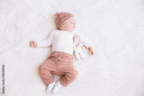 Cute little baby with toy b...