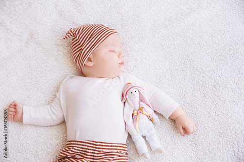 Cute little baby with toy b...