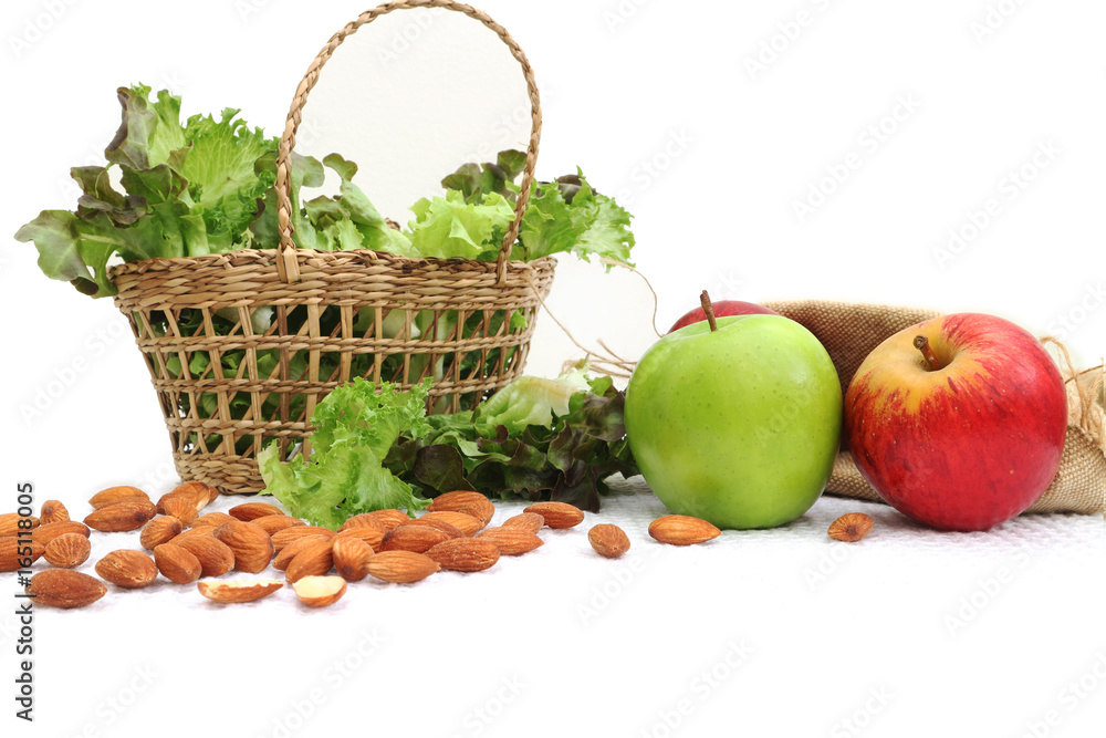 vegetable healthy set,almond and apple,Healthy  fresh vegetables and fruits on white wooden background.