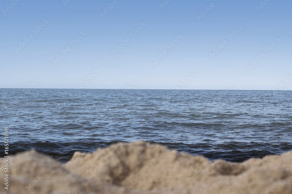 Sea landscape with beach. Sand on the beach. Blue sky. Nature landscape. Baltic Sea Sea landscape with beach. Sand on the beach. Blue sky. Nature landscape. Baltic Sea