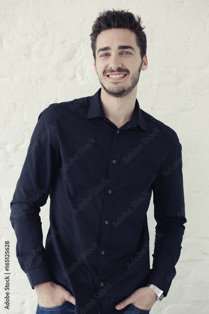 Portrait of young smiling man. Portrait of young smiling man.