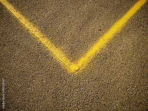 V shaped sign on a concrete pavement 