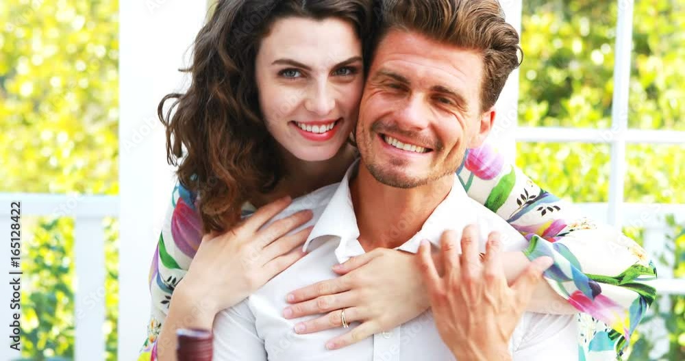 Portrait of romantic couple embracing each other