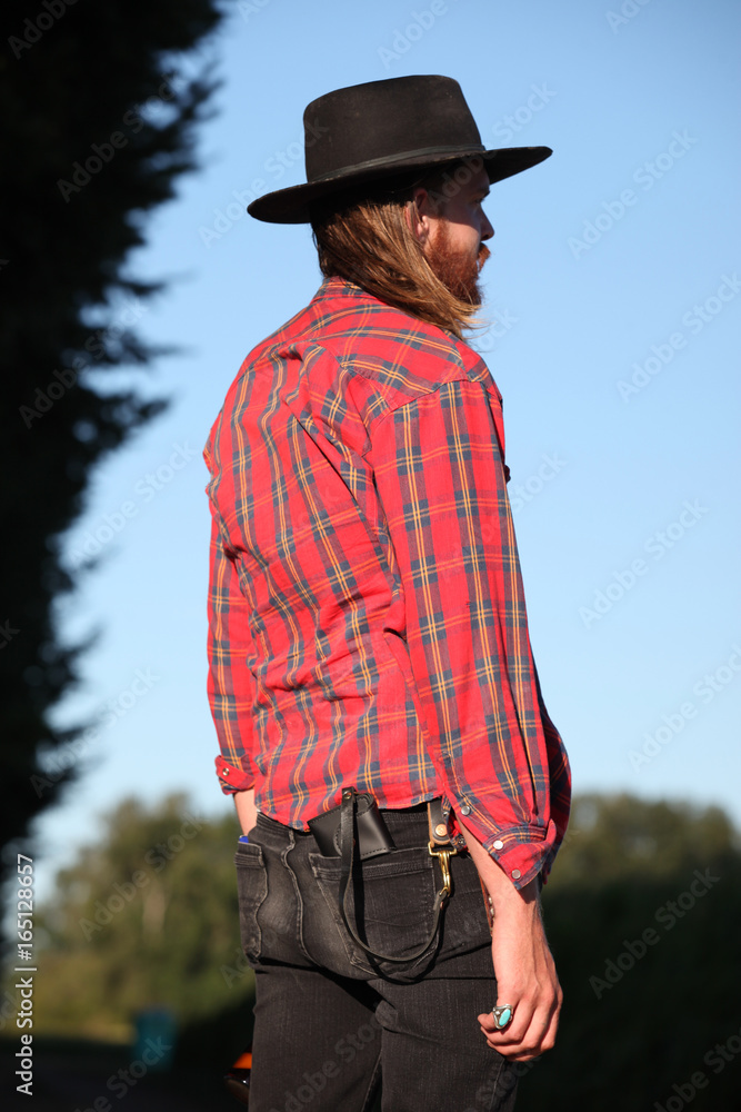 Portrait Of A Hipster Male On A Farm Portrait Of A Hipster Male On A Farm