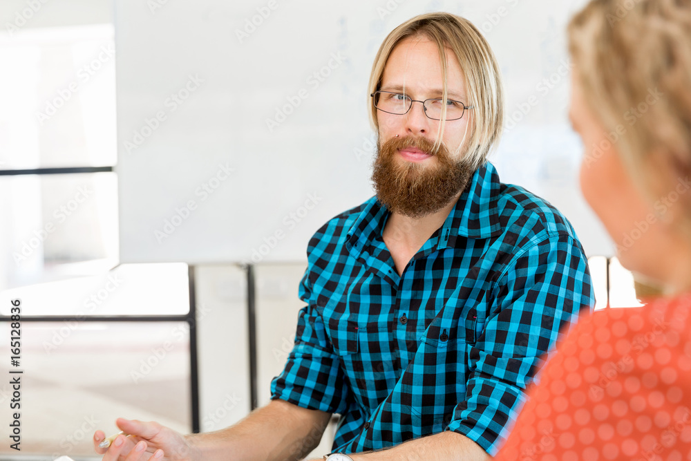Young man working in office Young man working in office