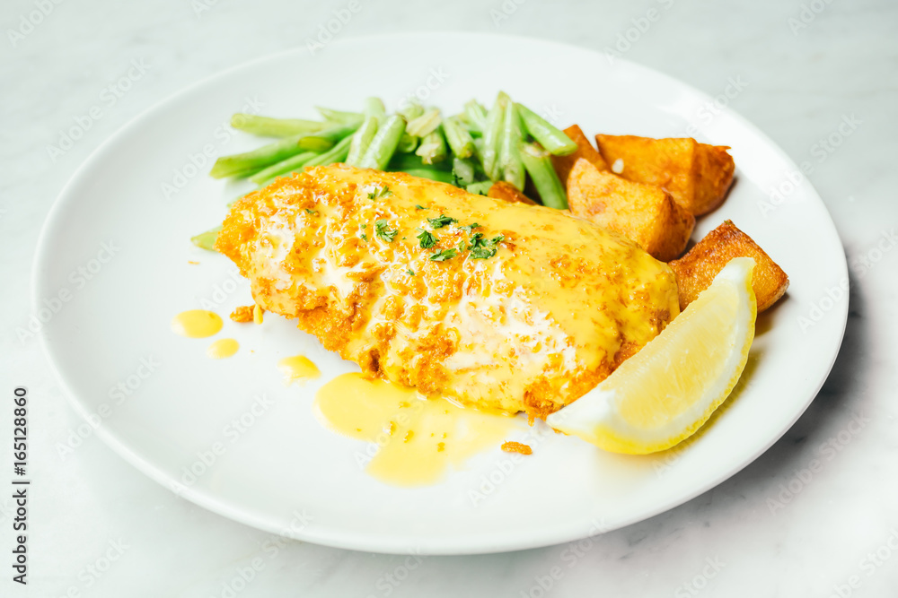 Fried chicken steak with lemon and vegetable Fried chicken steak with lemon and vegetable