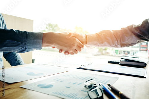 Business people colleagues shaking hands meting Planning Strategy Analysis Concept
