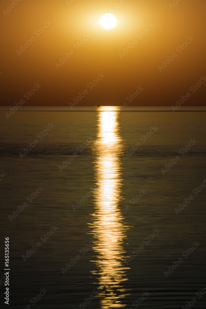 sunset on calm sea