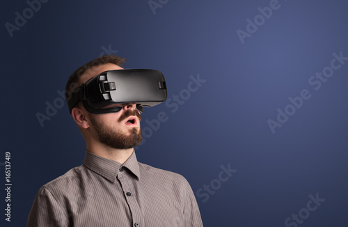 Businessman with virtual reality goggles © ra2 studio