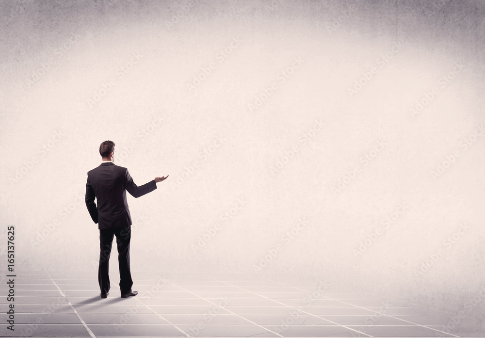Business person standing in empty space Business person standing in empty space