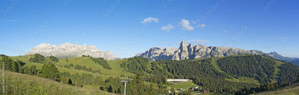 Great landscape on the Dolomites. View on Sella group, Bo peak, Gardenaccia massif and Sassongher summit. Alta Badia, Sud Tirol, Italy