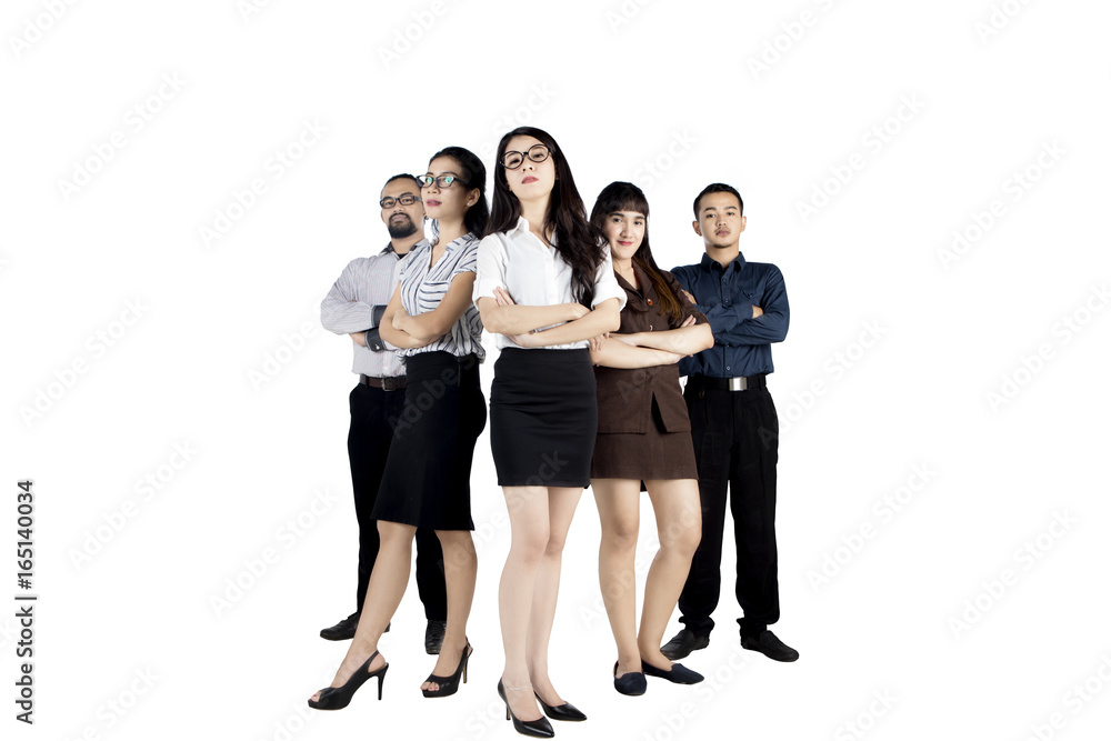 Confident business team standing in studio