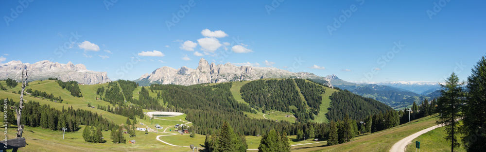 Great landscape on the Dolomites. View on Sella group, Boè peak, Gardenaccia massif and Sassongher summit. Alta Badia, Sud Tirol, Italy