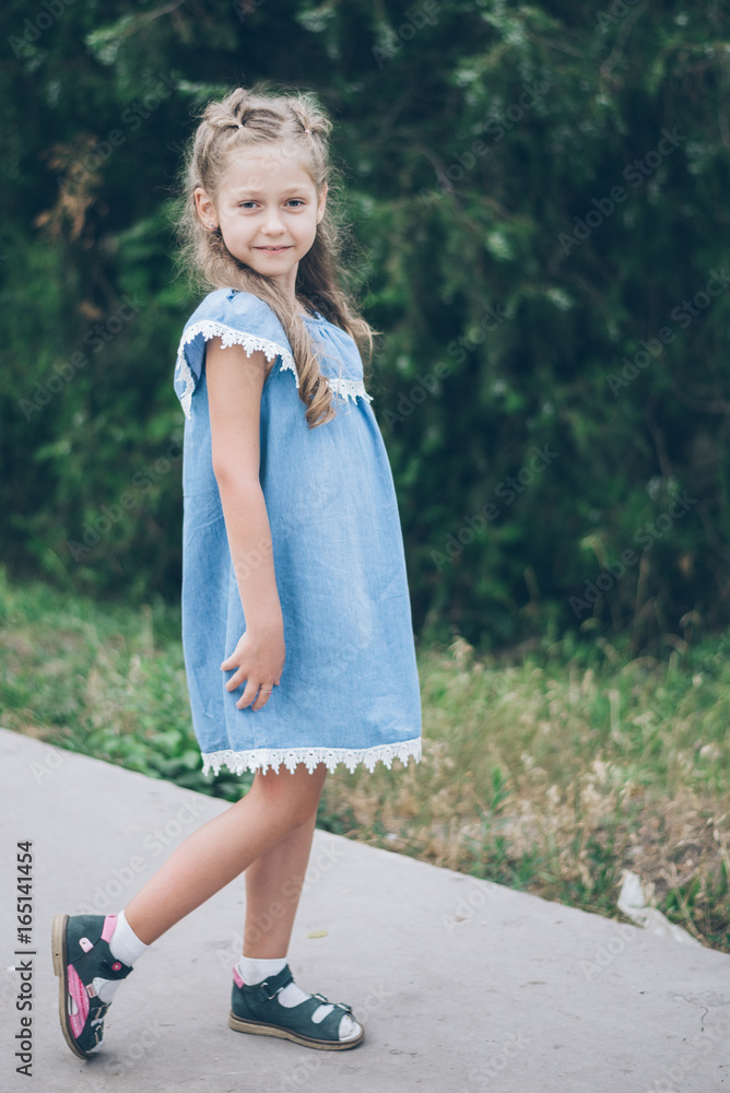 Cute little girl in summer park Cute little girl in summer park