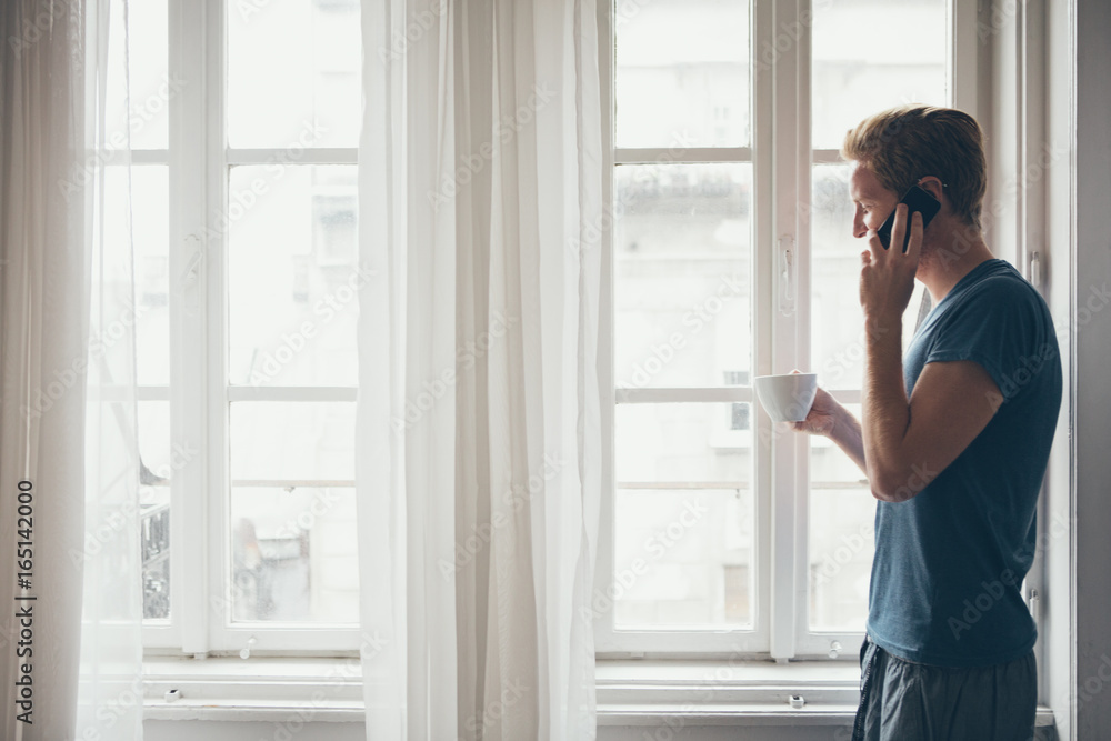 Young Man Telephoning by the Window Young Man Telephoning by the Window
