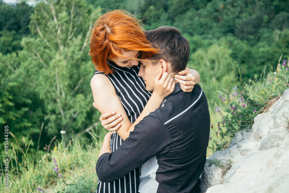 couple have a date on the peak of the hill couple have a date on the peak of the hill