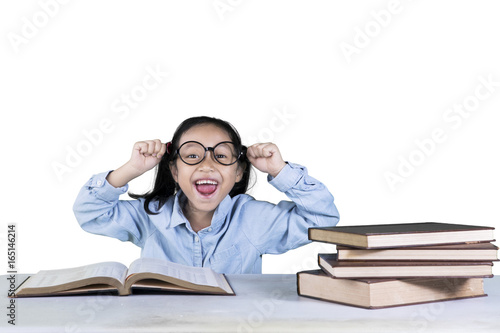 Successful elementary student with books