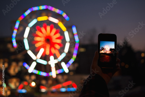  Taking photo at amusement park 