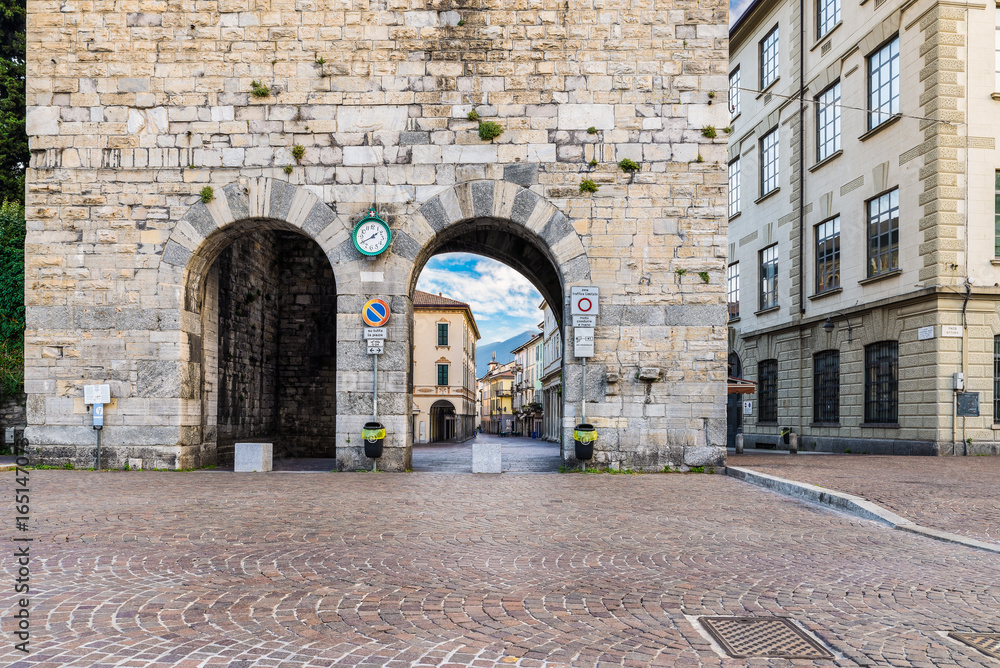 Como city, historic center, lake Como, Italy. Medieval tower (12th  century), called Porta Torre and the picturesque via Cantù Stock Photo |  Adobe Stock