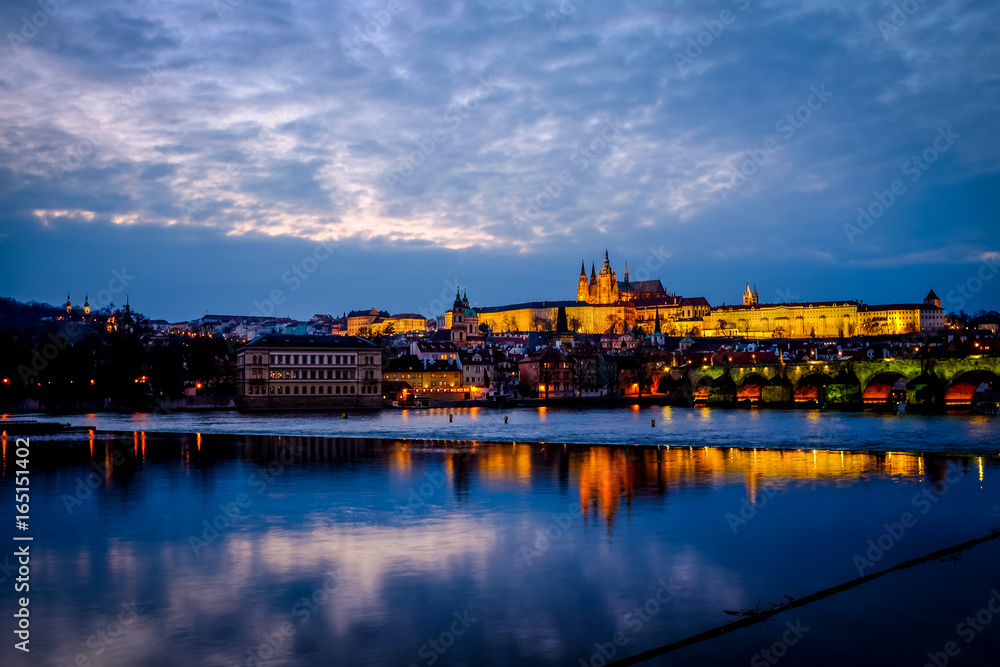 Prague Castle, Charles Bridge, and St. Vitus Cathedral in twilight at Prague, Czech Republic. 