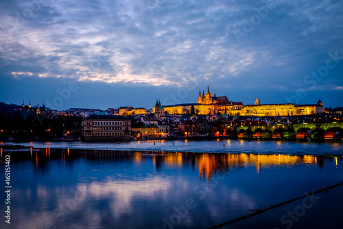 Prague Castle, Charles Bridge, and St. Vitus Cathedral in twilight at Prague, Czech Republic. 
