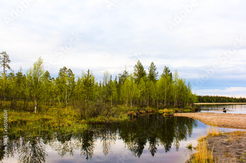 Evening landscape with a lake (Kola Peninsula, North of Russia)