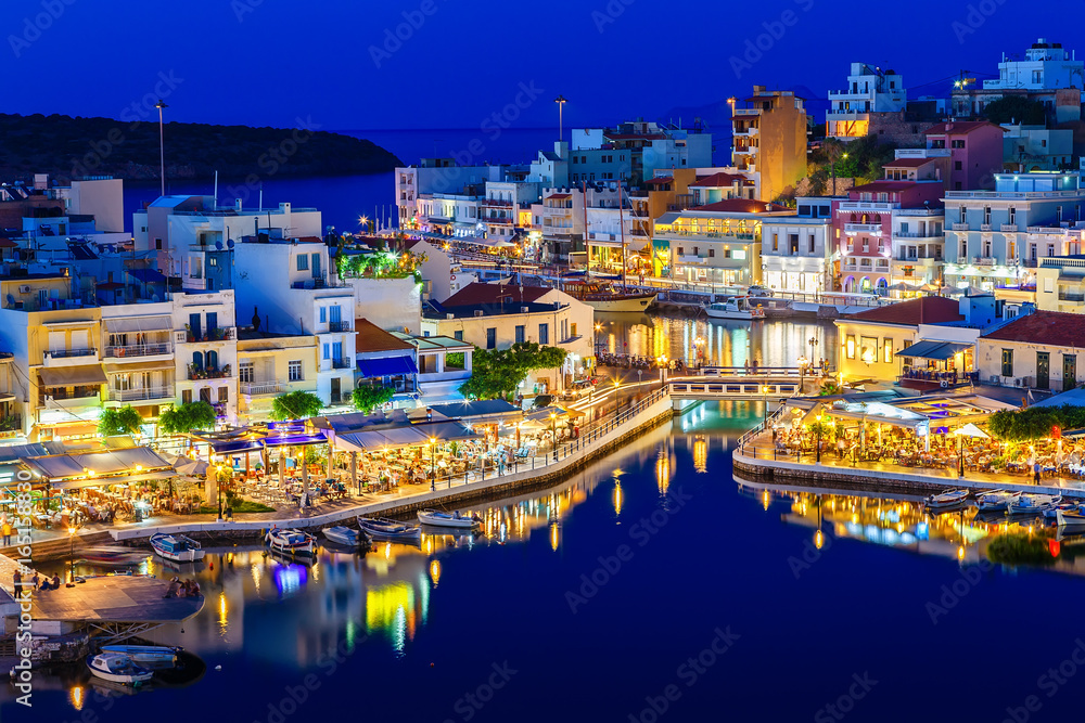 Aghios Nikolaos night view - picturesque town in the eastern of island Crete built on northwest side of the peaceful bay of Mirabello
