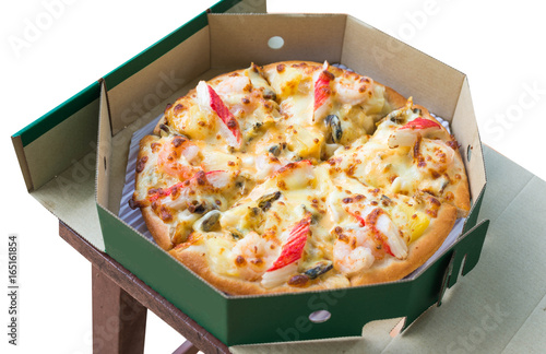 pizza with seafood on delivery box