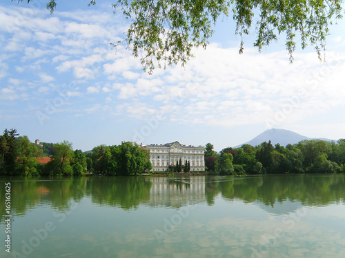 Lake Leopoldskroner Weiher with the Schloss Leopoldskron Palace in Salzburg, Austria 