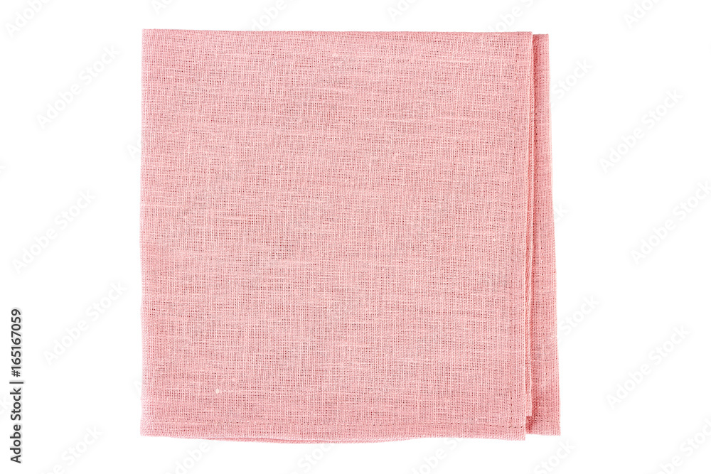 Fototapeta premium Folded pink textile napkin on white