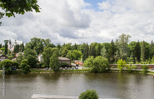 The ancient city of Sergiev-Passad. Lake in the center of the city. Architecture of the century before last. The city is drowning in greenery. View of the city and the lake from the mountain.