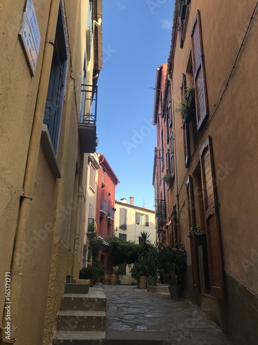 Small colorful alley in a town  south of France