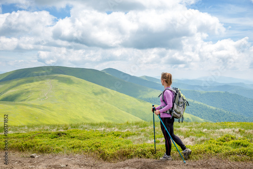 Young woman hiking in the mountains