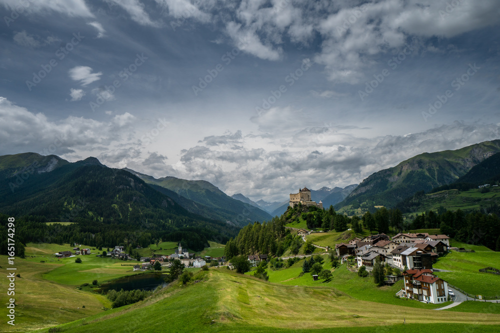 panorama view of the beautiful alpine village of Tarasp and the lower Engadin Valley in the Alps in Switzerland