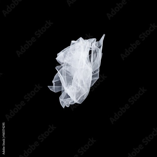 White fabric isolated on black background 