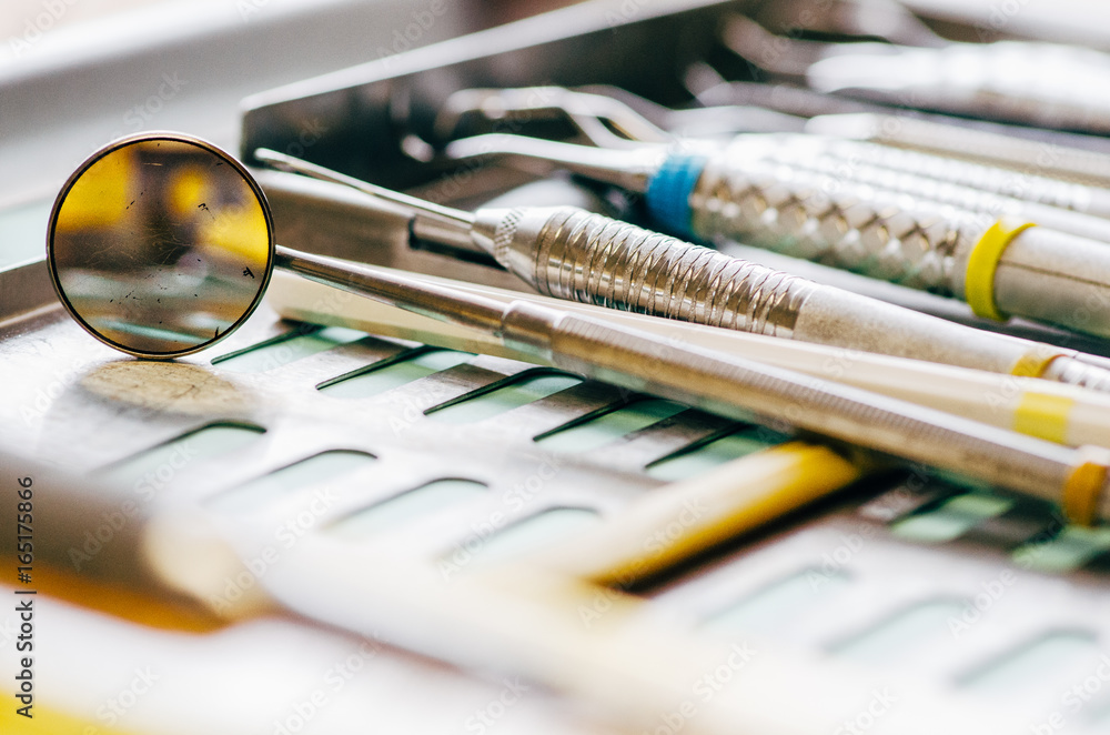 close up of dental tools on a tray close up of dental tools on a tray