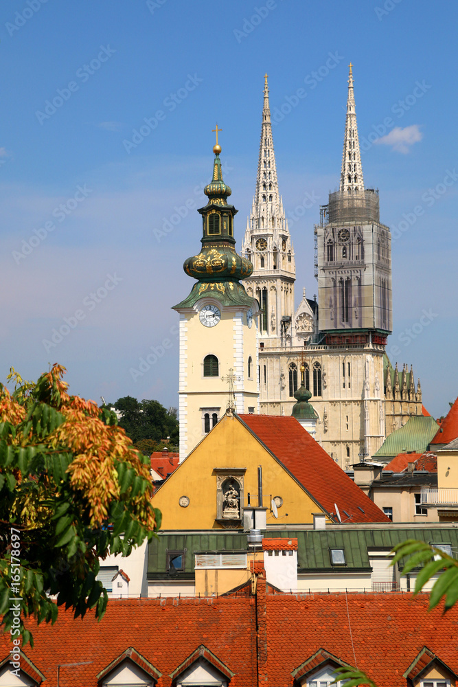 Zagreb skyline with Zagreb Cathedral and St. Mary Church. View from Strossmayer Promenade on Upper Town.
