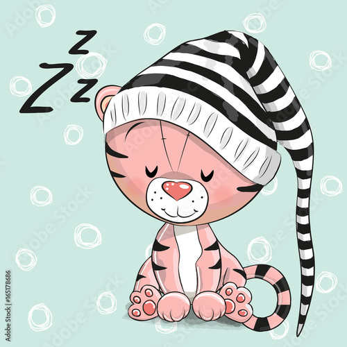 Fototapeta Naklejka Na Ścianę i Meble -  Sleeping cute Tiger in a hood