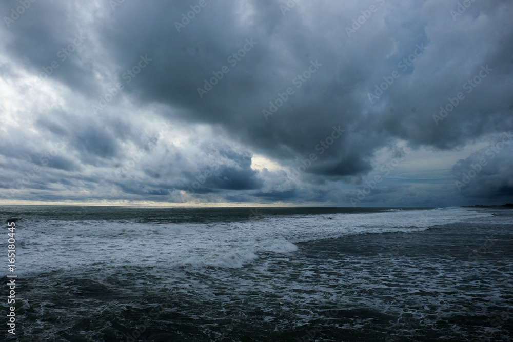 tropical sea storm coming at Glagah beach