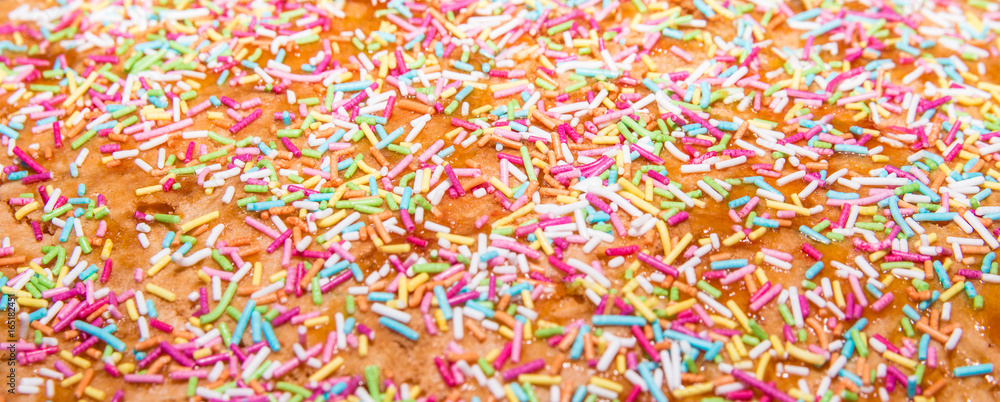 Sugar sprinkle, decoration for cake and bekery, a lot of sprinkles as a background Sugar sprinkle, decoration for cake and bekery, a lot of sprinkles as a background