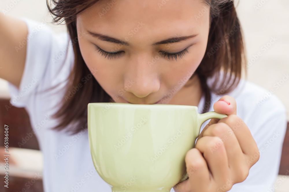 Enjoying the coffee aroma