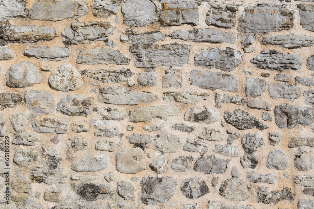 Pattern of the ancient style stone wall with cement. Pattern of the ancient style stone wall with cement.