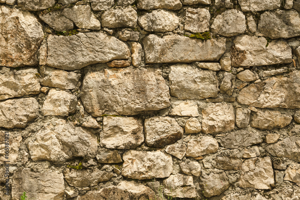 Pattern of the ancient style stone wall with cement. Pattern of the ancient style stone wall with cement.